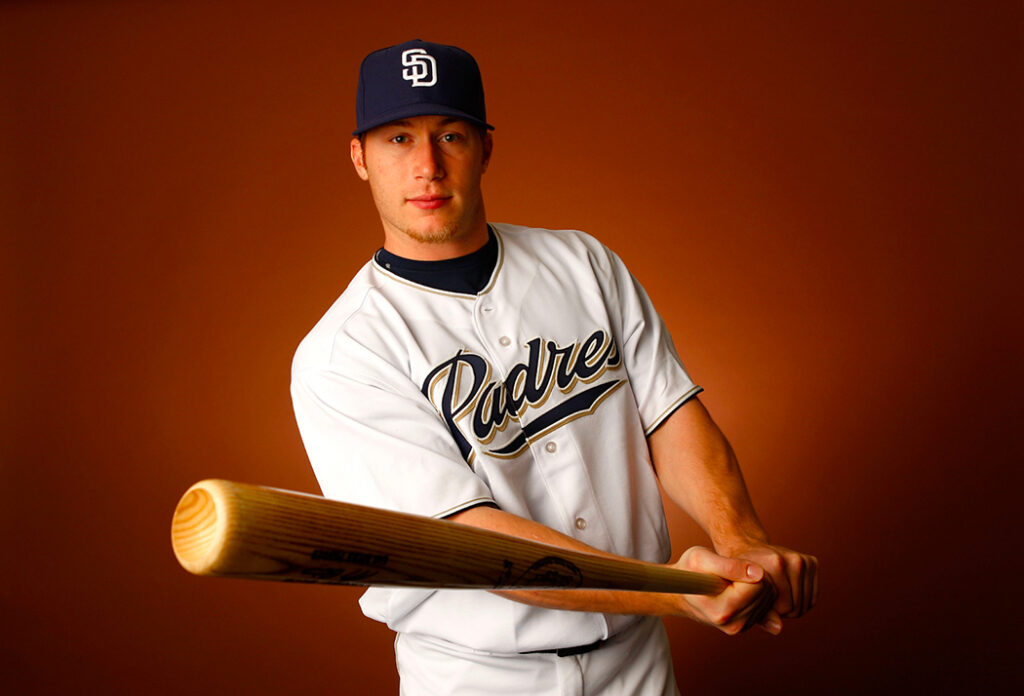 Matt Antonelli in a Padres uniform and a bat